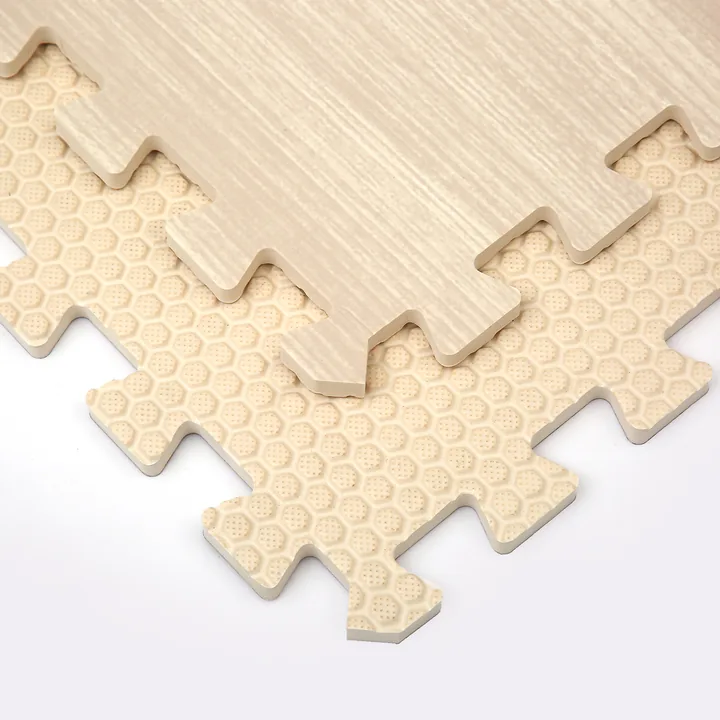 Close view of a wood-look EVA tile and its joint profile