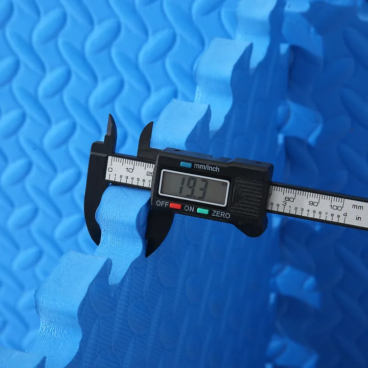 A caliper used to inspect a leaf-pattern EVA sample