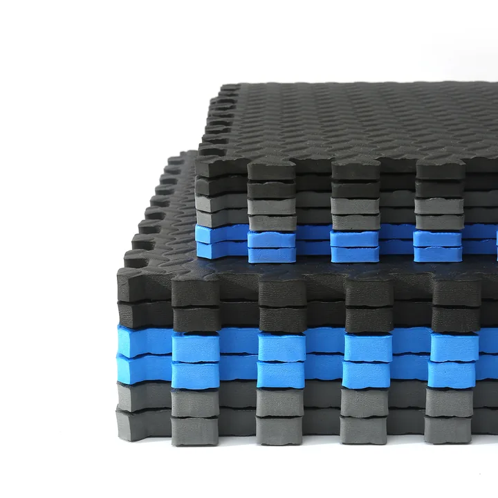 Leaf-pattern EVA tiles arranged in a supported stack