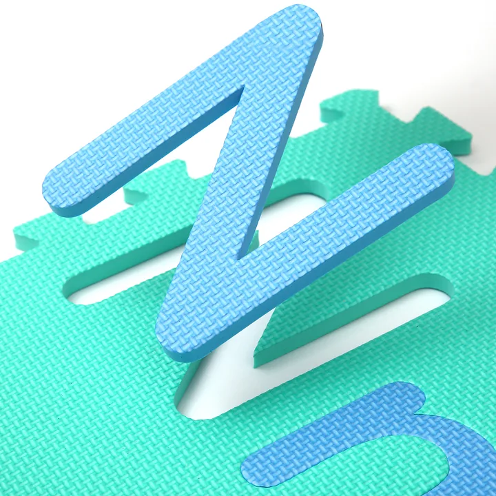 Removable pieces in a puzzle play tile design