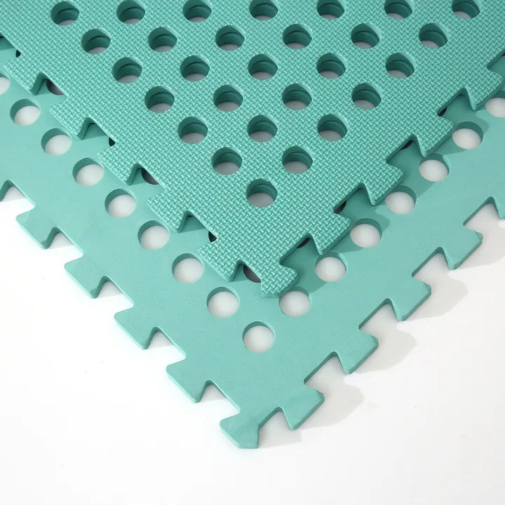 Perforated EVA grid tiles and interlocking edges